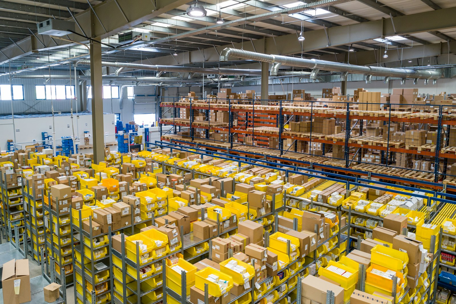 Warehouse aisles with stacked goods ready for dispatch